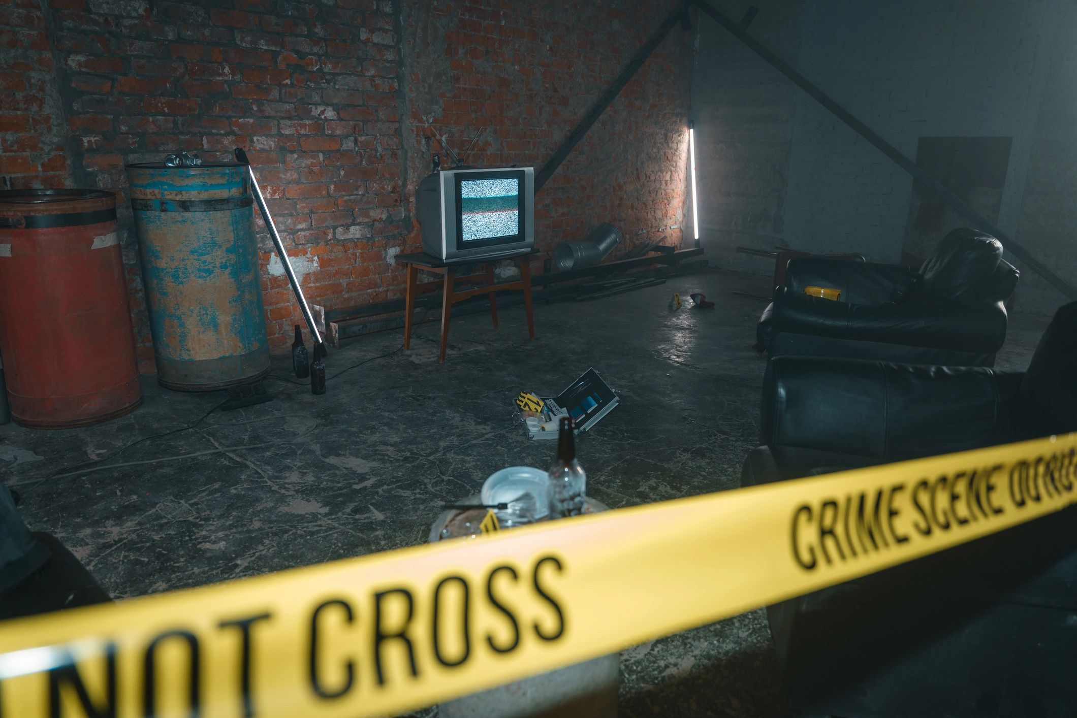 Barricaded crime scene used to illustrate fingerprint and evidence logic challenges