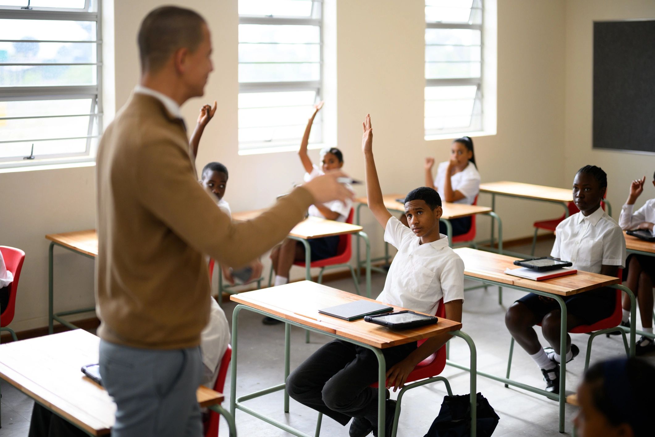 Students engaged in a classroom-style activity representing premium puzzle pack previews