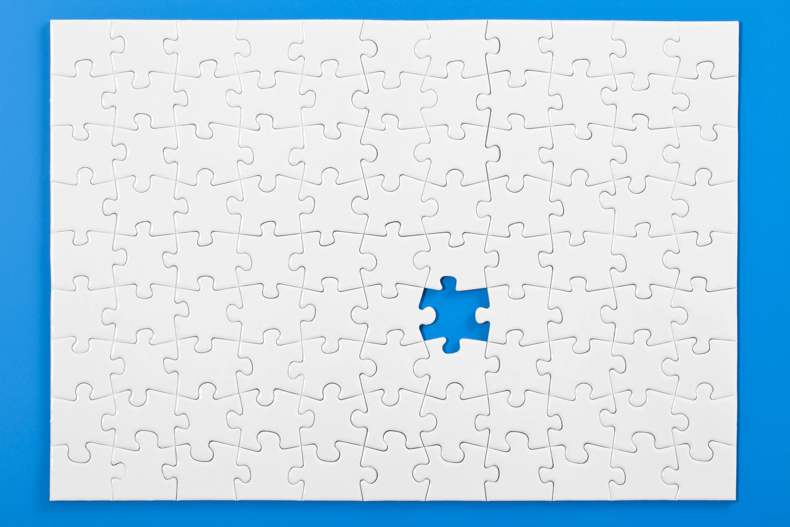 Puzzle with one missing piece