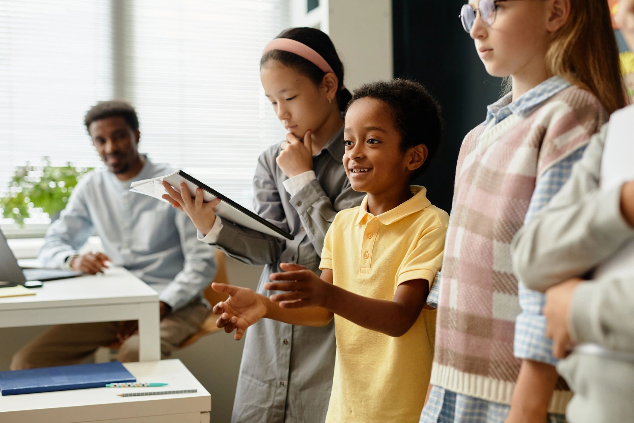Student presenting work in a classroom