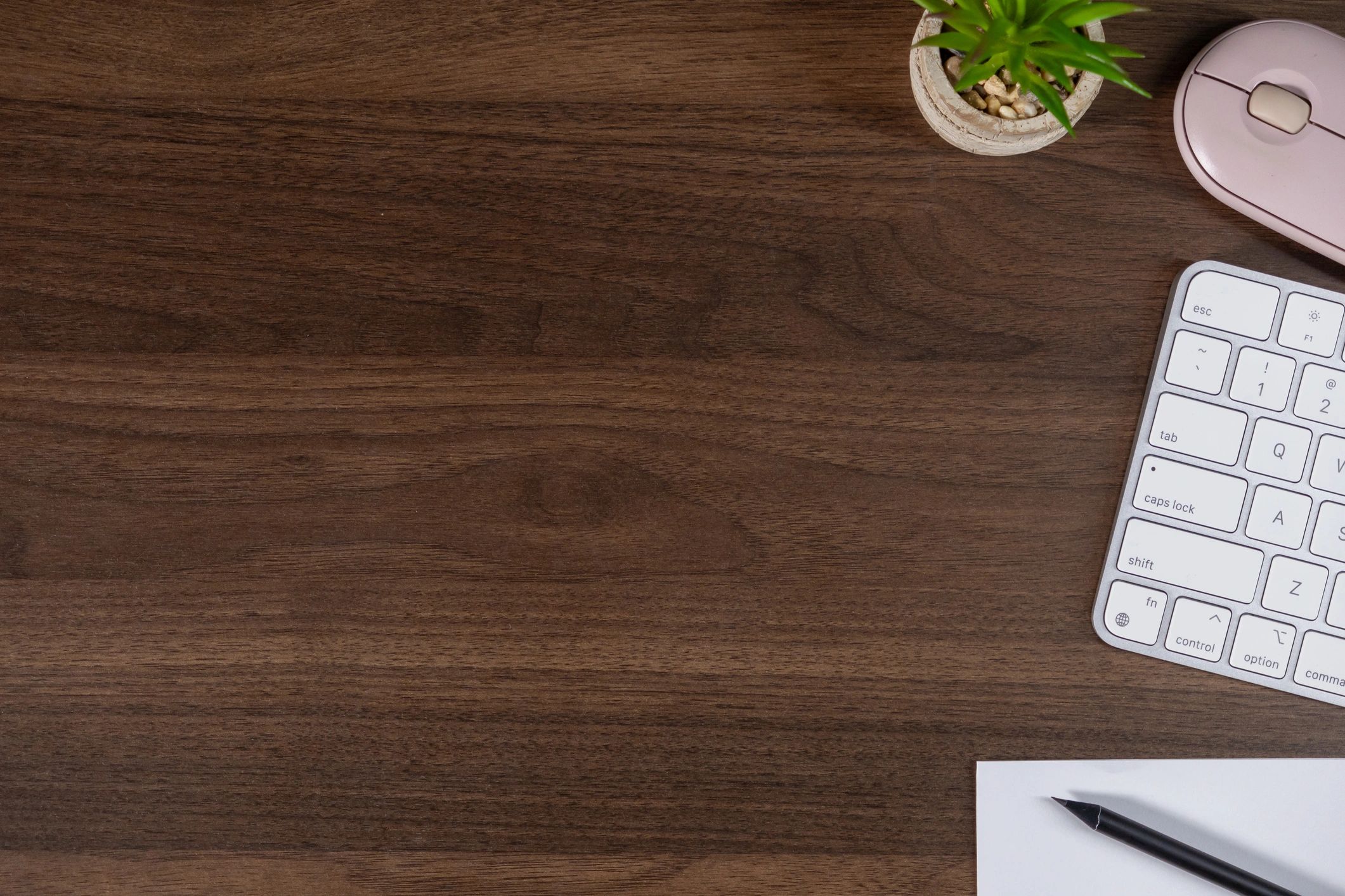 Desk setup with notebook and workspace for puzzle solving