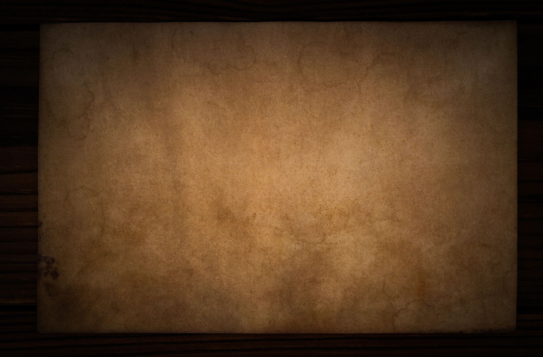 Aged paper on wooden table for mystery case files