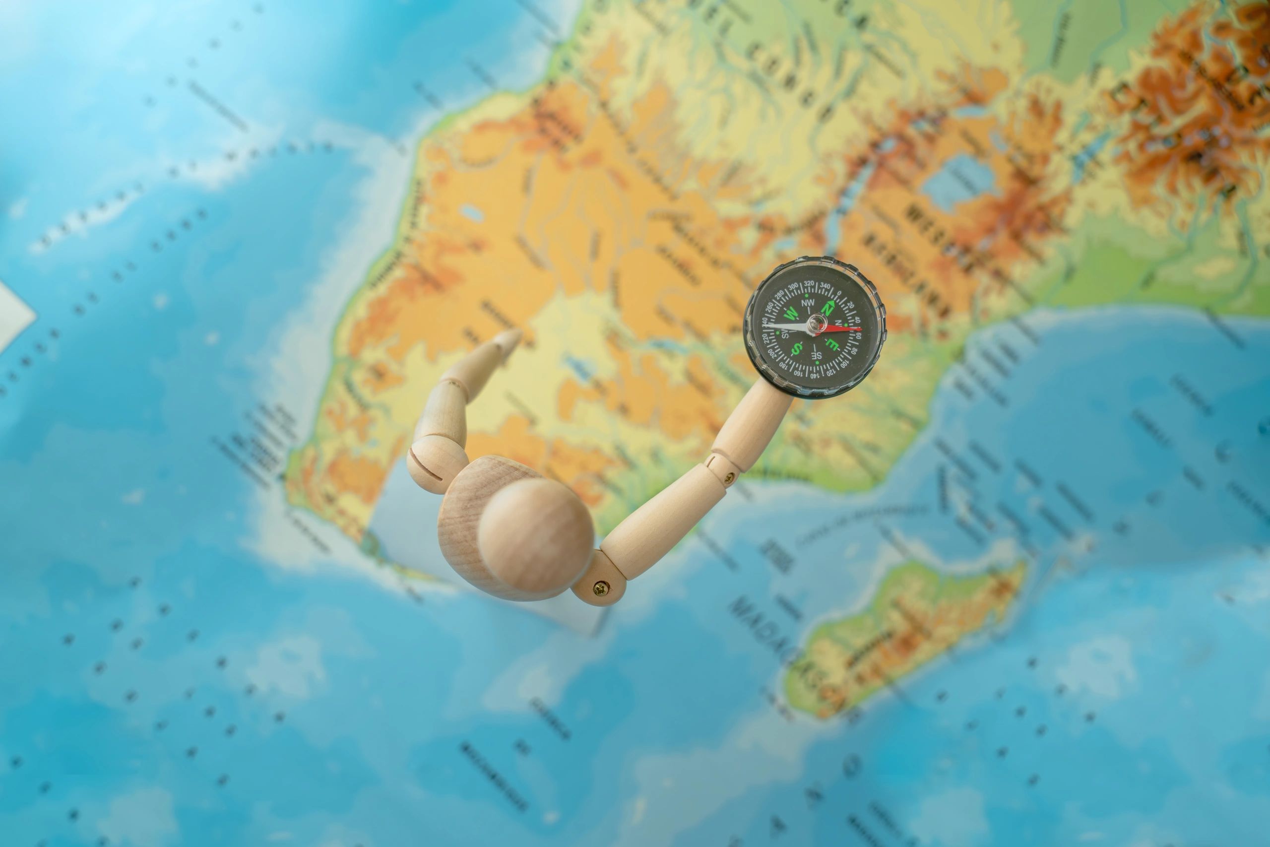 Compass over vintage map symbolizing streak tracking and progress